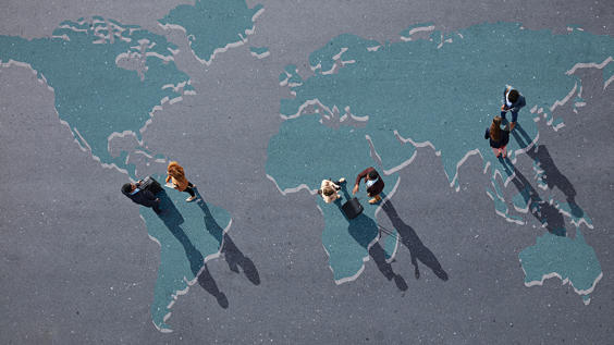 People standing on world map